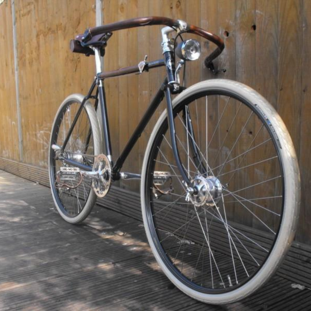 Customer photo from London England showing 1920&#39;s vintage style Guvnor bicycle with top bar shifter and brass accents, and dark brown sew-on leather bar wraps. 